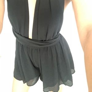 Black Wrap around Romper dress.